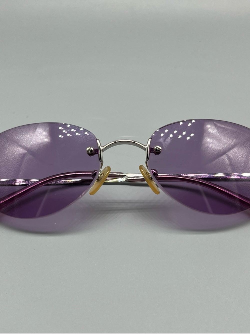 CHANEL Purple Rimless Sunglasses with Silver Bridge